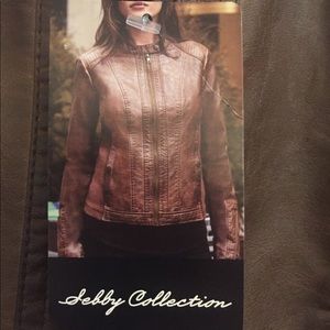 Brand new imitation leather jacket. Tags on